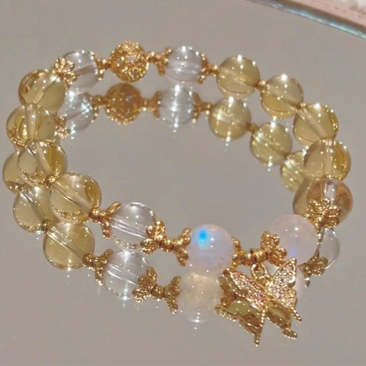 Armband Mondstein Citrin Schmetterling Gold elastisch Perlen Handgelenk getragen