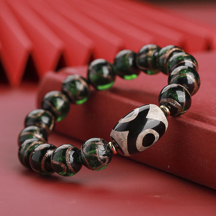 Armband – Wohlstand Balance mit schwarzen Perlen und Tibetan-Dzi Stein