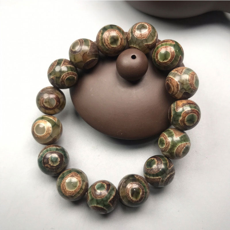 Armband Onyx – Glück mit grünen bemalten Perlen und braunem Stein