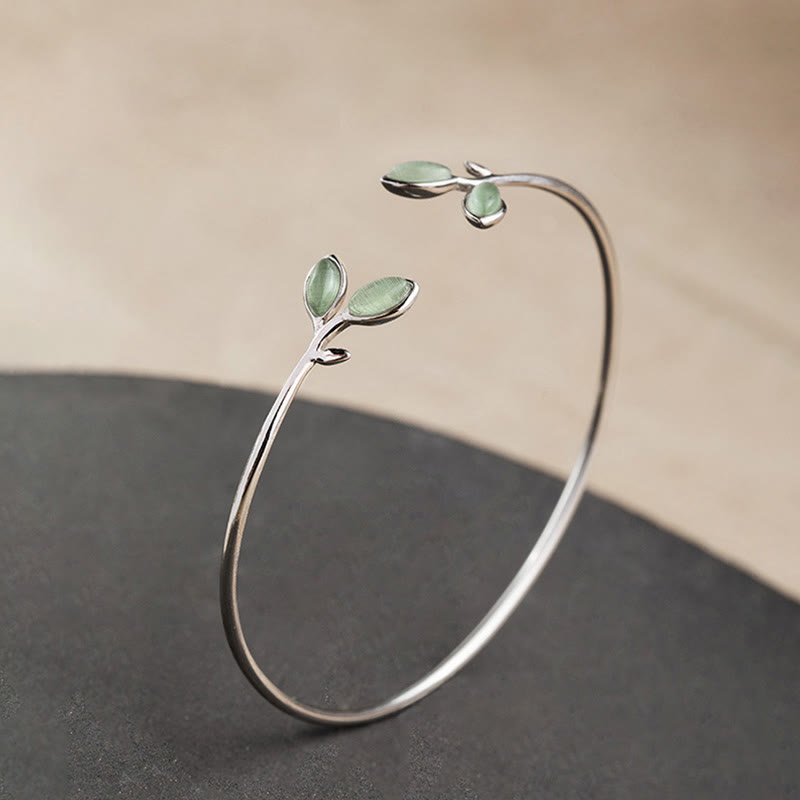 Silbernes Armband Blatt Katzenauge elegant geschwungen Design.