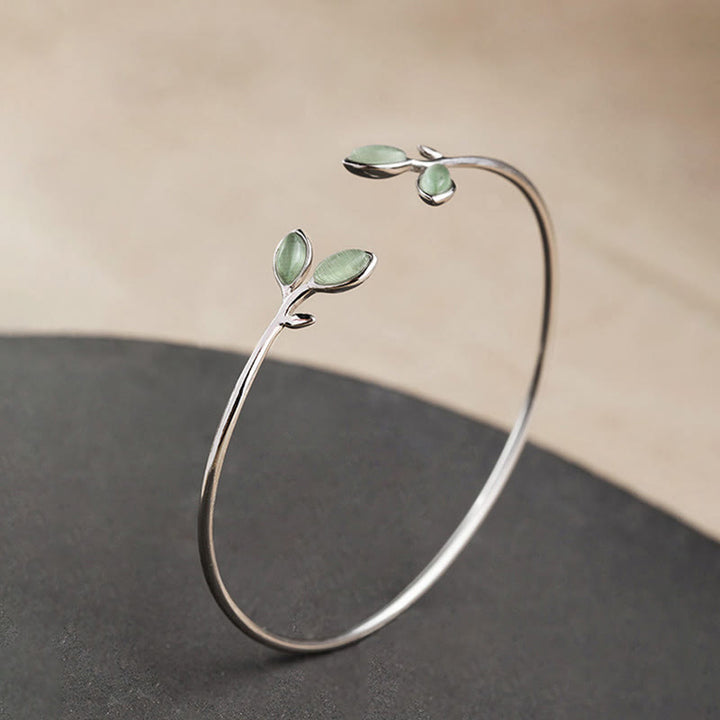 Silbernes Armband Blatt Katzenauge elegant geschwungen Design.