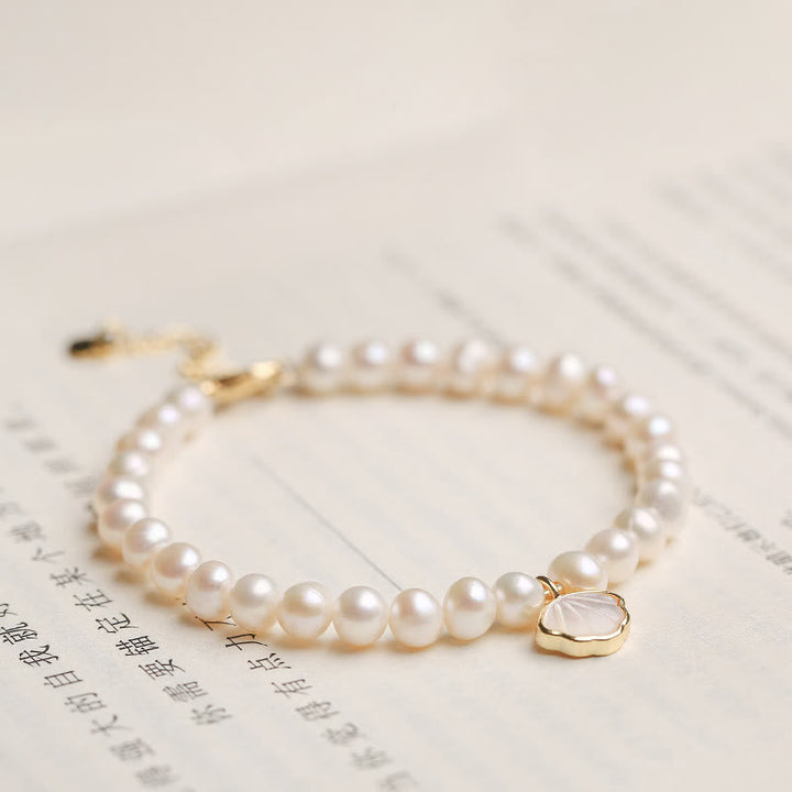 Armband Kristall Perle weiß elegant Rosenquarz Anhänger gold