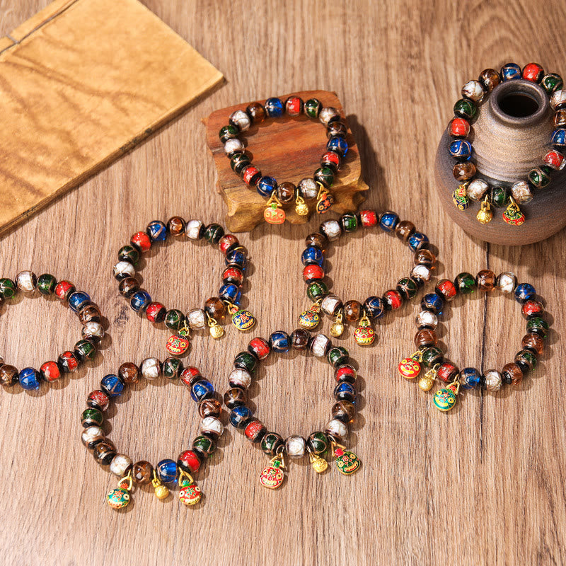 Armband Fünf Elemente – Glück Balance mit bunten Perlen und Glöckchen.