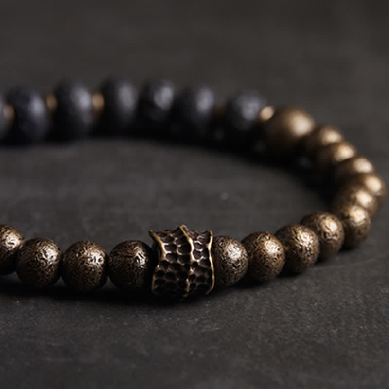 Kupfer Armband mit strukturierten Perlen und Ornament elegant
