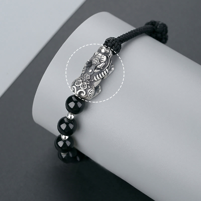 Schwarzes Obsidian Pixiu Armband 925 Silber elastisch am Handgelenk getragen