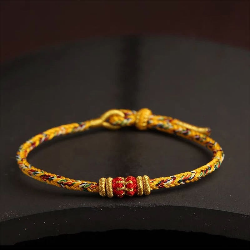 Armband Bunt Geflochten Knoten – Glück mit roten Perlen elegant