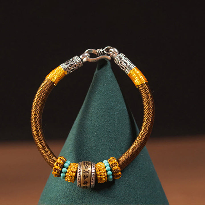 Armband – Schutz & Glück Stärke golden geflochten Türkis Perlen Verschluss