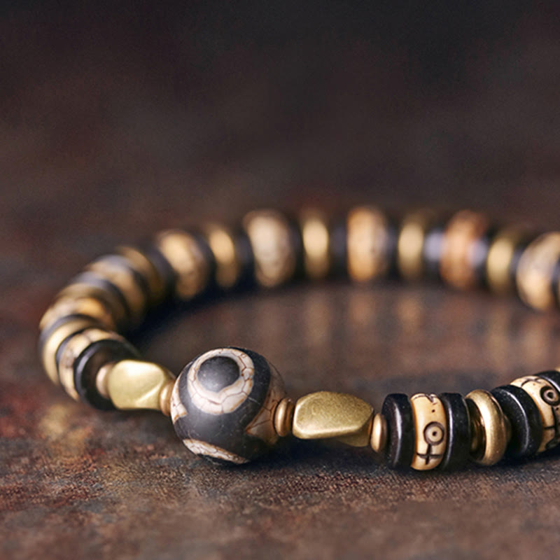 Armband Ebenholz mit goldenen Perlen Stärke und Energie Naturstein