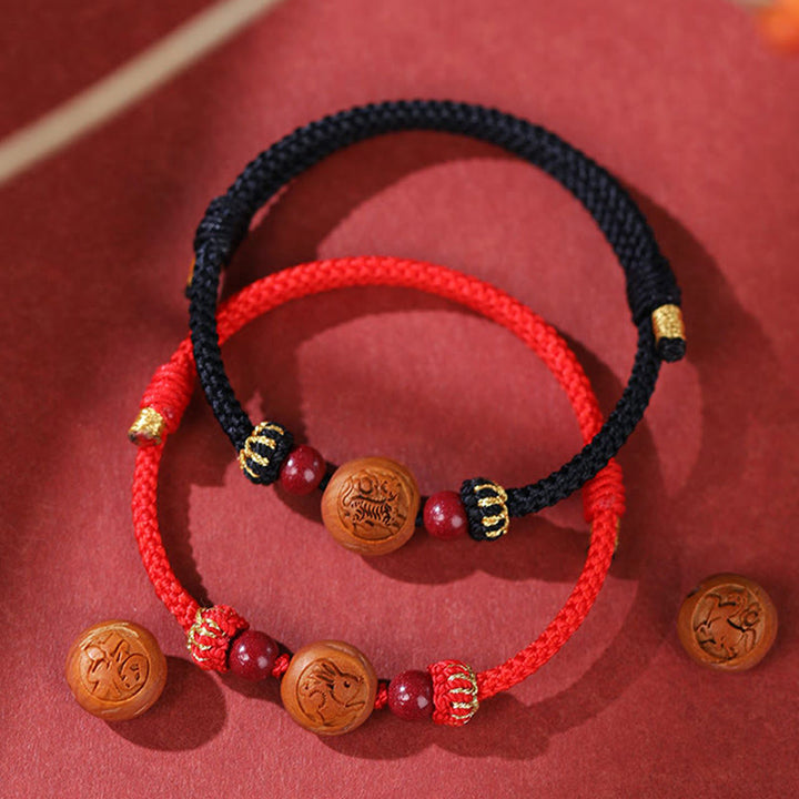 Armband Zinnober Chinesisches Tierkreis – Wohlstand rote schwarze Schnur Perlen
