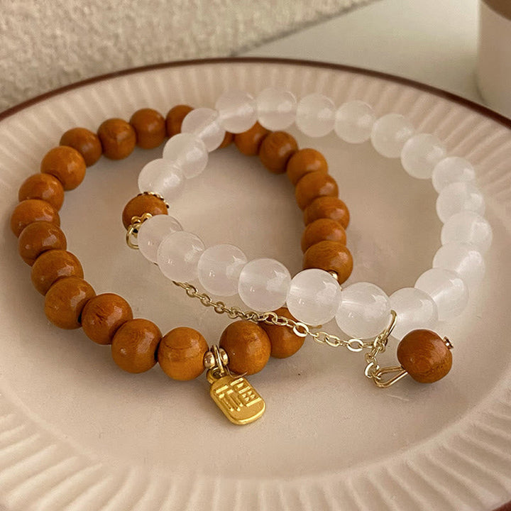 Armband Sandelholz Fu-Zeichen Schutz weißer Kristall elegant kombiniert