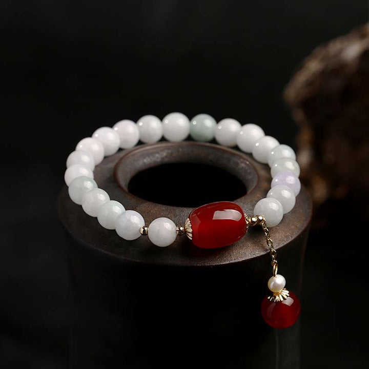 Armband Weiße Jade Achat Schutz elegantes Design rote Steine