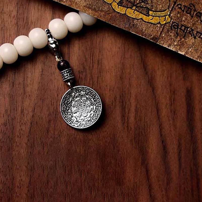 Mala Achat Bodhi – Wohlstand Armband mit weißen Perlen und silbernem Anhänger