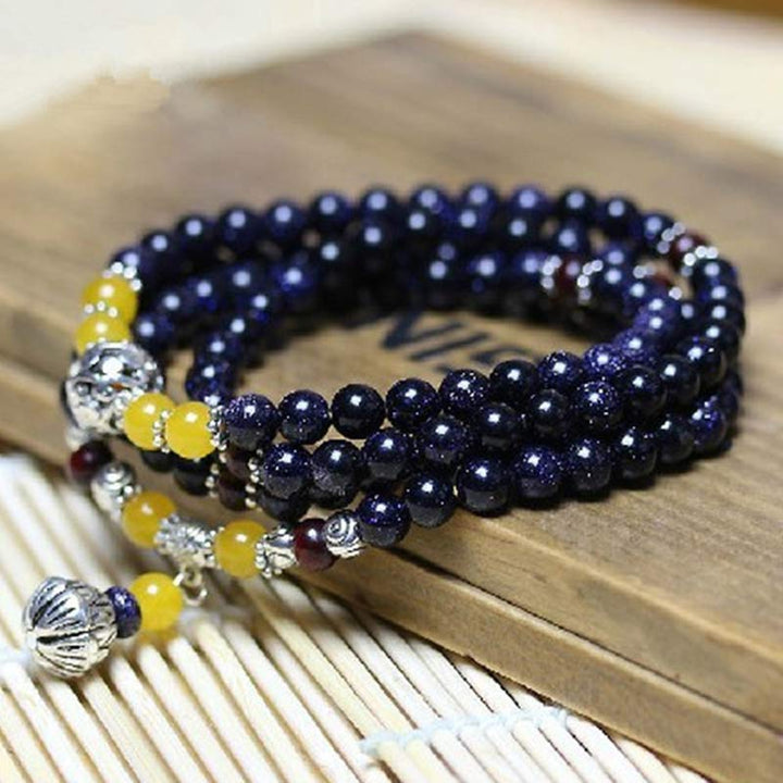 Mala – Wohlstand Armband aus schwarzem Obsidian mit gelben Perlen elastisch.