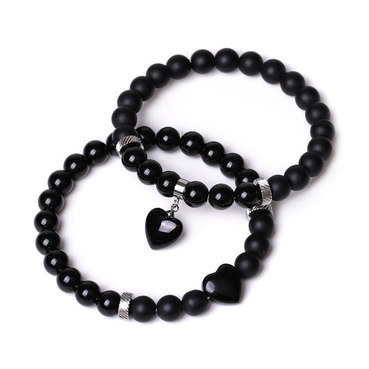 Armband Schwarzer Onyx Kristall Paar mit Herzanhänger elegantes Design