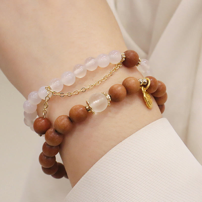 Armband Sandelholz Fu-Zeichen Schutz Rosenquarz Perlen gold elegant