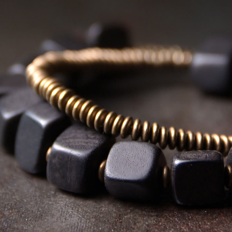Armband Kupfer Ebenholz Frieden mit metallischen Perlen elegant.