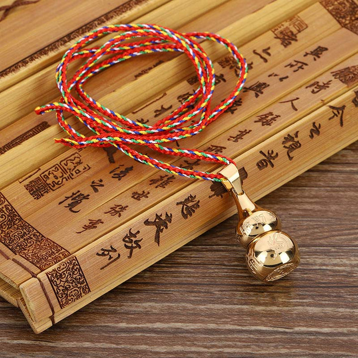 Goldene Kürbis Anhänger Kette bunte Kordel Tibet Harmonie