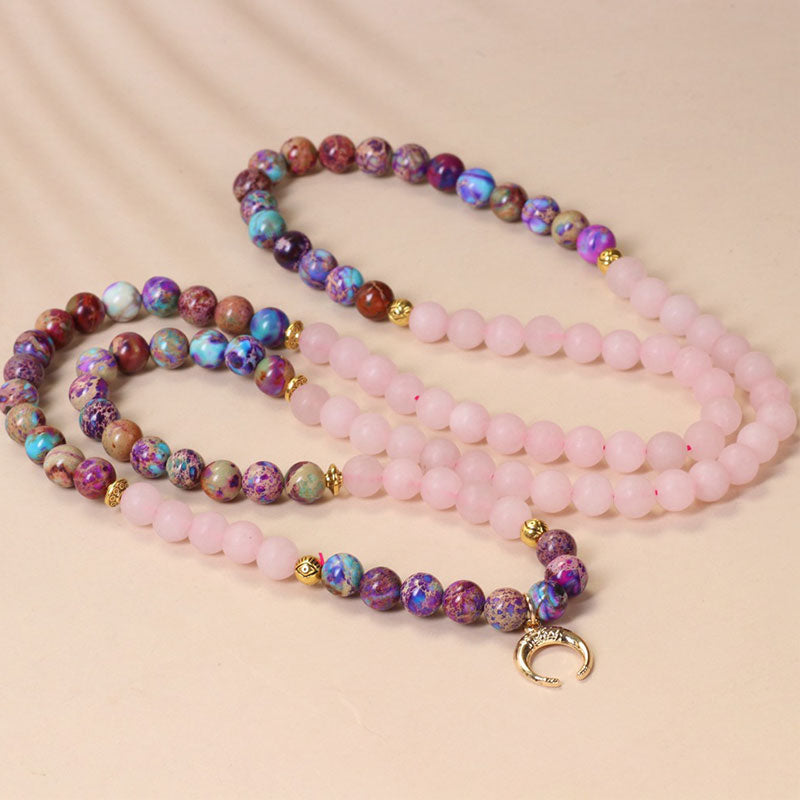 Mala 108 Rosenquarz Perlen Heilstein Armband Flachaufnahme rosa violett