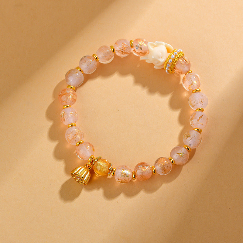 Armband Lotus – Glück Rosenquarz Perlen mit Goldelementen elegant.