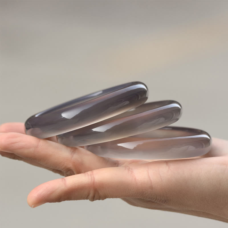 Armband – Harmonie Balance Obsidian glänzend elastisch Handgelenk getragen