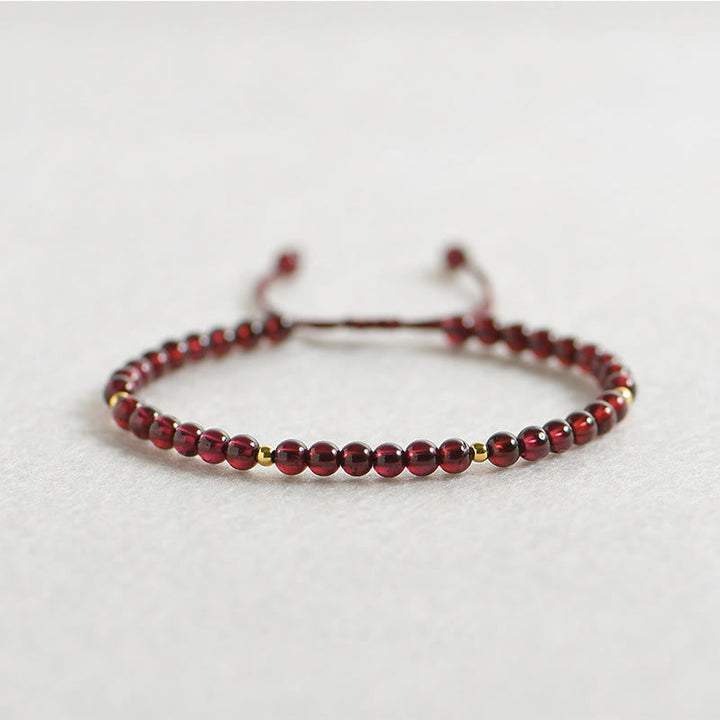Armband Granat goldene Perlen Stabilität elastisch rot Naturstein