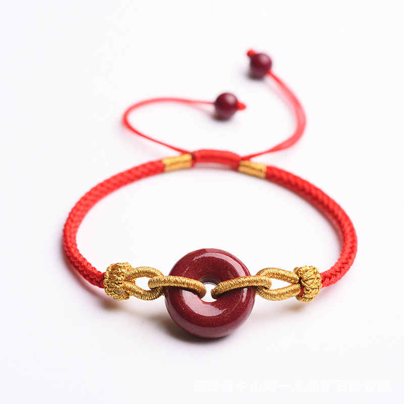 Armband Zinnober mit goldenem Verschluss rotes elastisches Armband