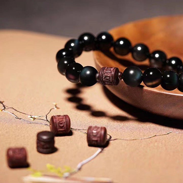 Schwarzes Obsidian Armband mit Om Mani Padme Hum Perlen elastisch