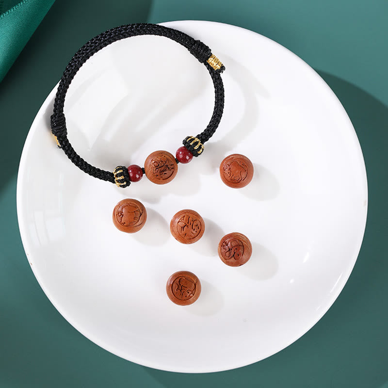 Armband Zinnober Chinesisches Tierkreis – Wohlstand mit roten Perlen schwarzem Seil
