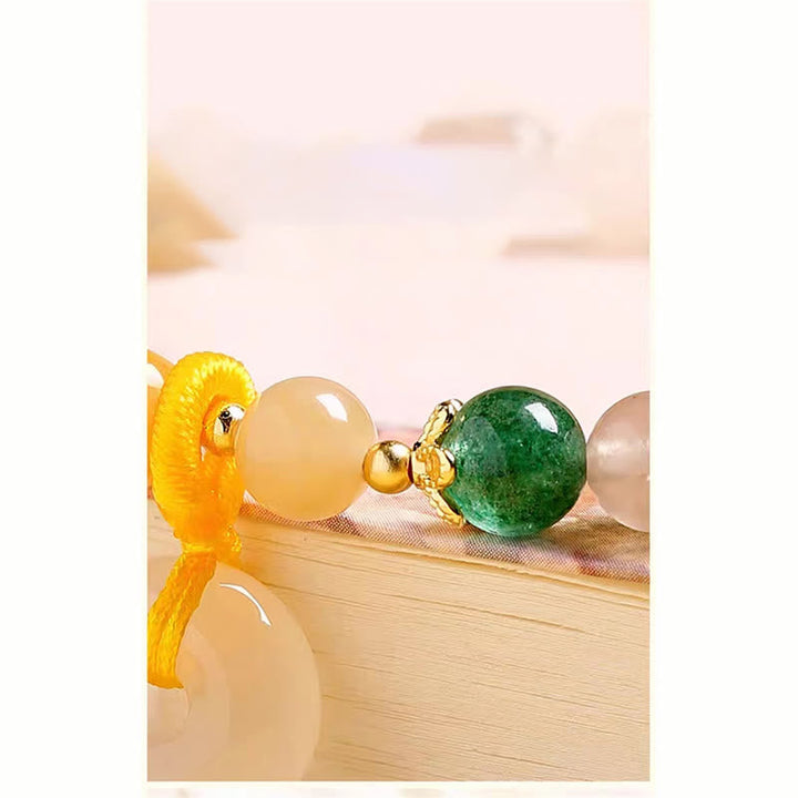 Jade Armband Wohlstand Frieden grüner Stein goldene Perlen Glücksbringer.