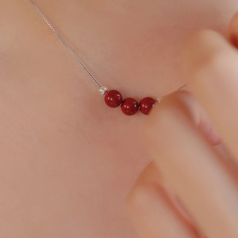 Zinnober Anhänger Sterlingsilber Kette rot Perlen