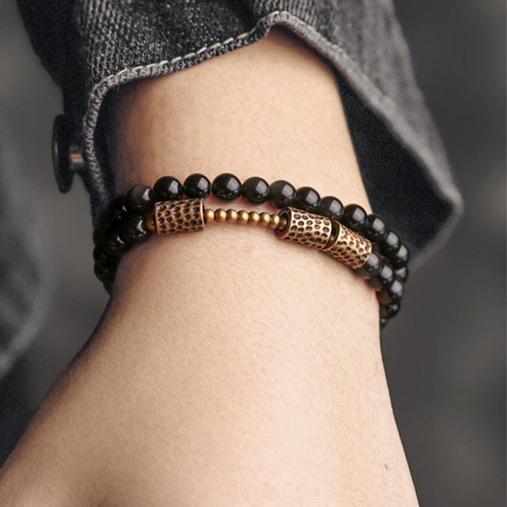 Armband Obsidian Kupfer Liebe schwarze Perlen Handgelenk getragen elegant