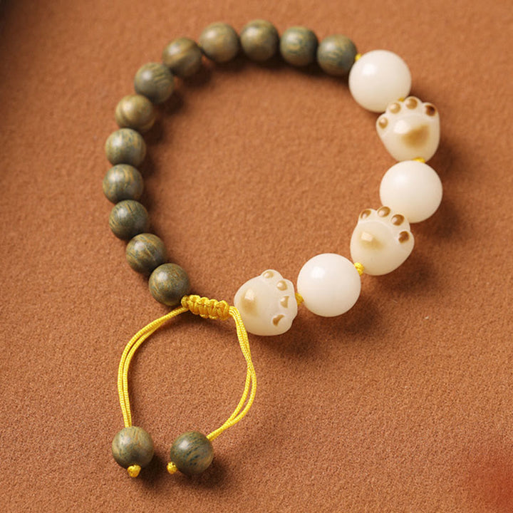 Armband Sandelholz Bodhi Katze Perlen grün weiß elastisch