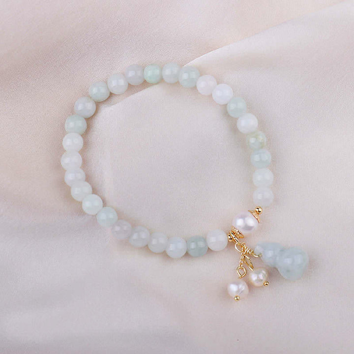 Armband Perle Jade Glück Wohlstand weiß grün elegant Naturstein