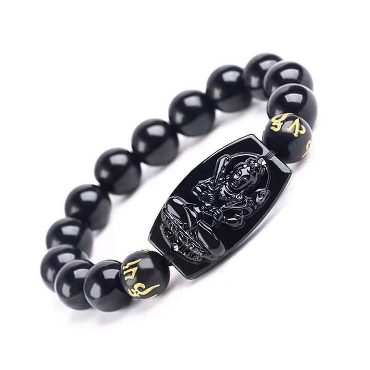 Schwarzes Obsidian Armband mit Pixiu Anhänger elastisch getragen
