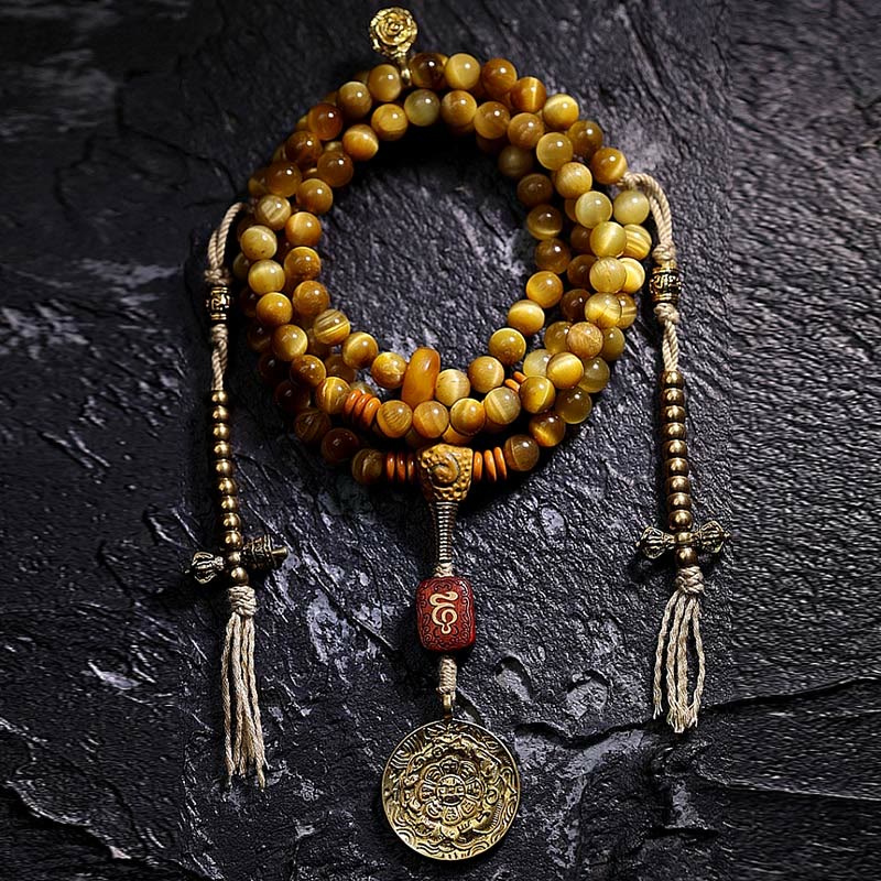 Mala Tigerauge Kupfer – Schutz Armband mit goldenem Anhänger auf Stein
