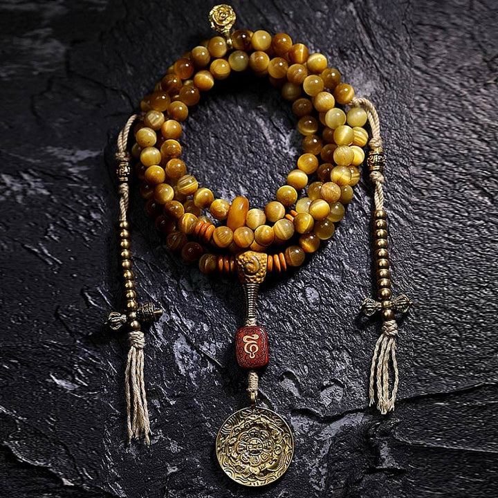 Mala Tigerauge Kupfer – Schutz Armband mit goldenem Anhänger auf Stein