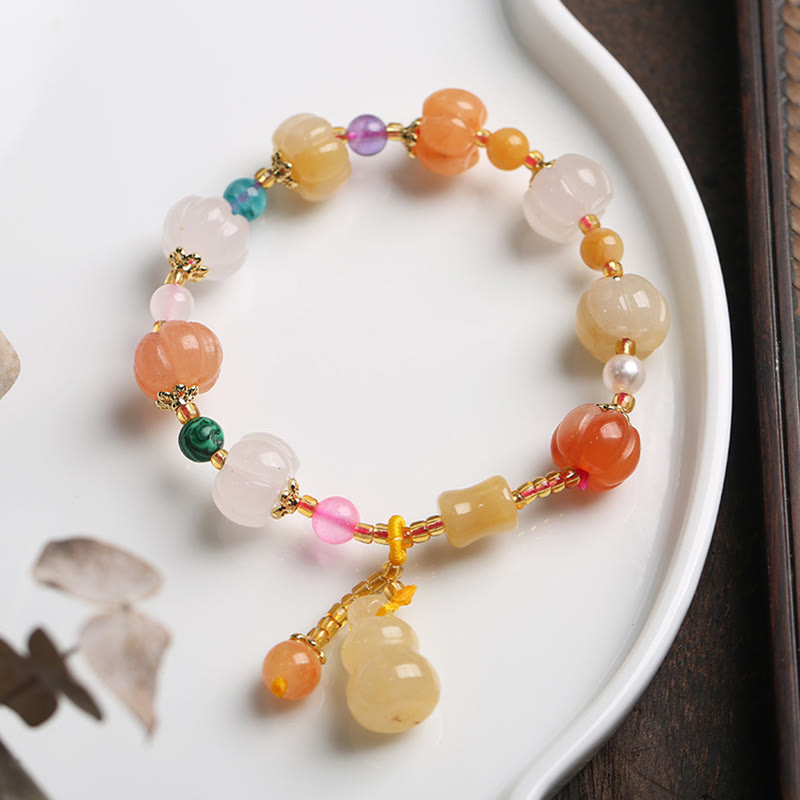 Armband Kristall Jade mit farbigen Steinen und goldenem Zubehör Schale