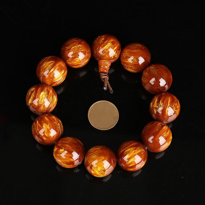 Mala – Erfolg Armband mit glänzenden bernsteinfarbenen Perlen Naturstein