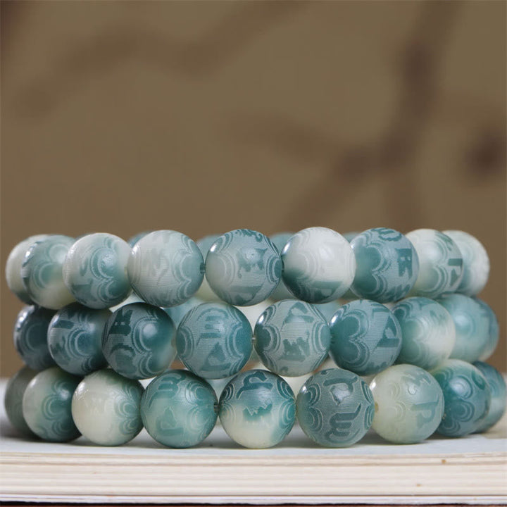 Bodhi Om Mani Padme Hum Armband Jade Perlen mintgrün weiß Naturstein