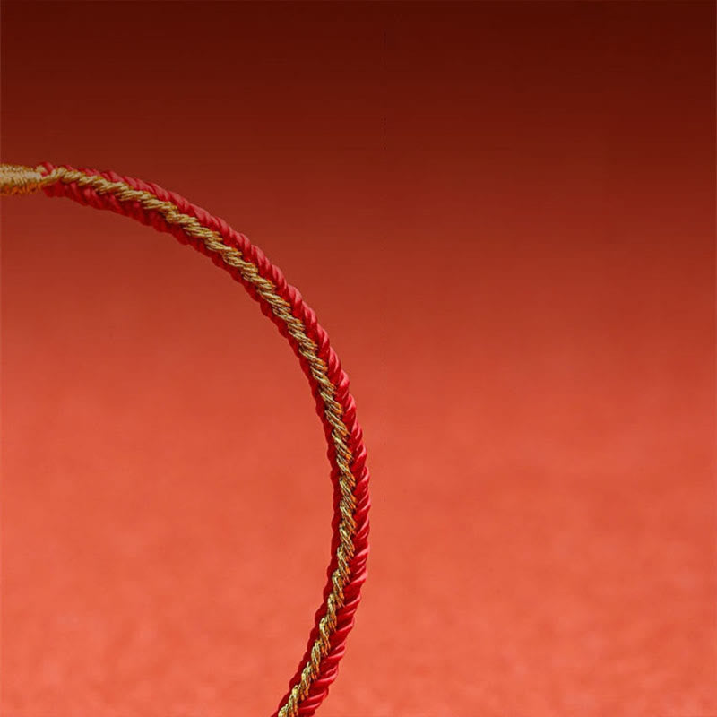 Rotes Armband mit goldenen Fäden Chinesisches Tierkreis – Schutz elegant.