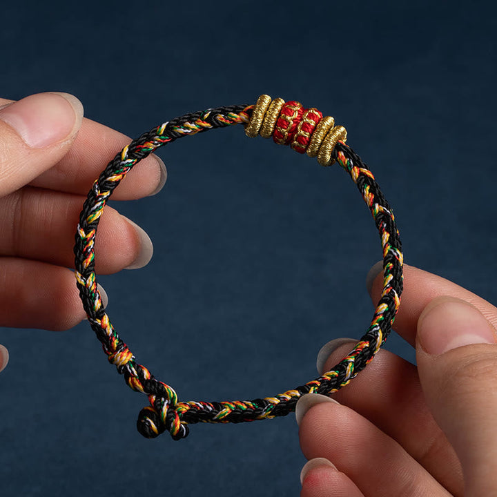 Armband Schutzbuddha – Glück & Stärke geflochtenes Seil goldene Perlen Handgelenk