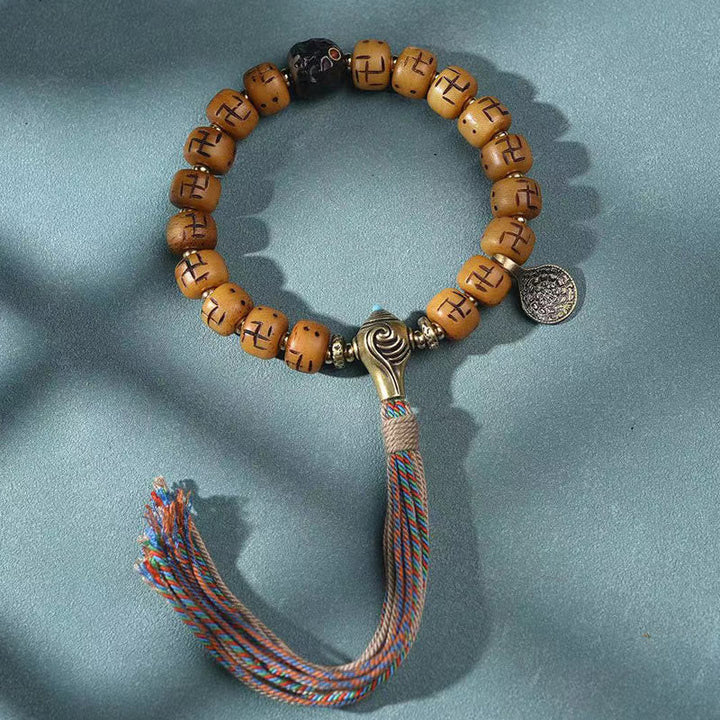 Armband Kamelknochen mit Schutzanhänger und bunter Quaste elastisch