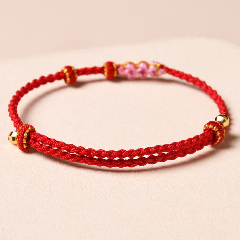 Rotes Armband Pfirsichblüte – Schutz elastisch geflochtenes Seil Gold