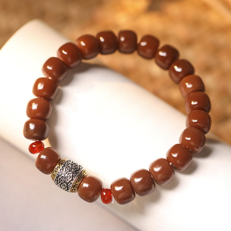 Bodhi-Armband mit braunen Perlen und silbernem Verschluss eleganz.