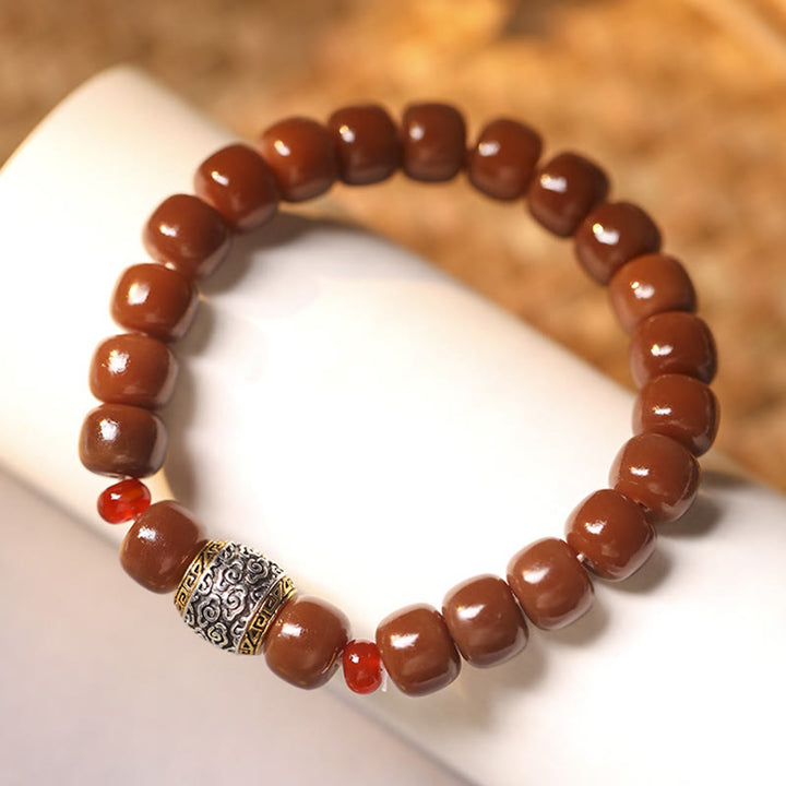 Bodhi-Armband mit braunen Perlen und silbernem Verschluss eleganz.