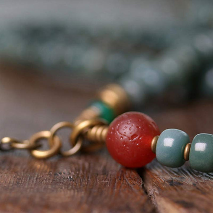 Mala 108 Perlen Bodhi – Energie rote grüne Perlen Bronze Verschluss Holz
