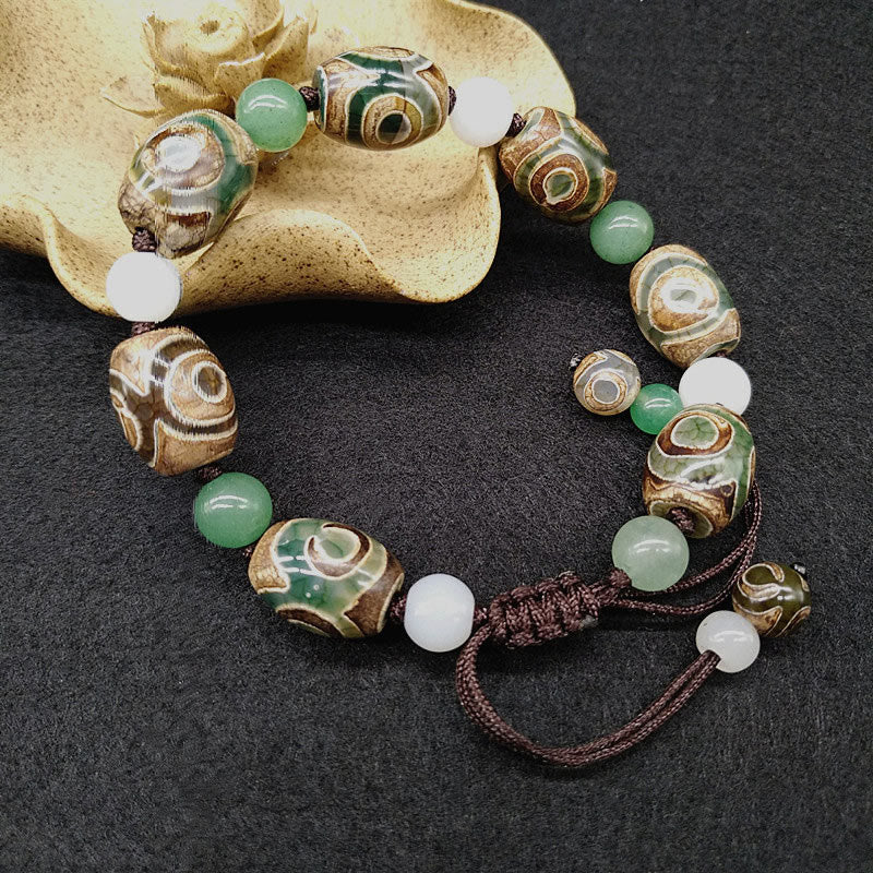 Armband Dzi Perle – Schutz & Glück mit grünen Jadekugeln und braunem Seil