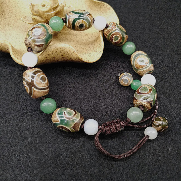 Armband Dzi Perle – Schutz & Glück mit grünen Jadekugeln und braunem Seil