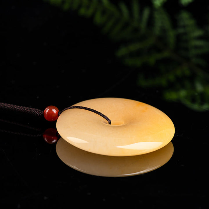 Kette goldene Jade Anhänger Donut Naturstein
