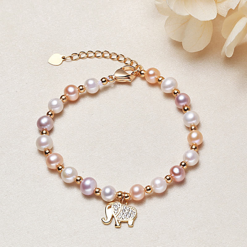 Armband Perle Elefant rosegold mit bunten Perlen und Elefantanhänger.
